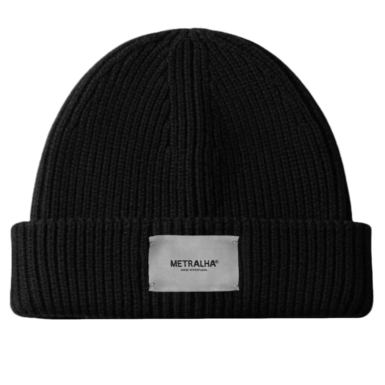 Black beanie with a white label on a gray background