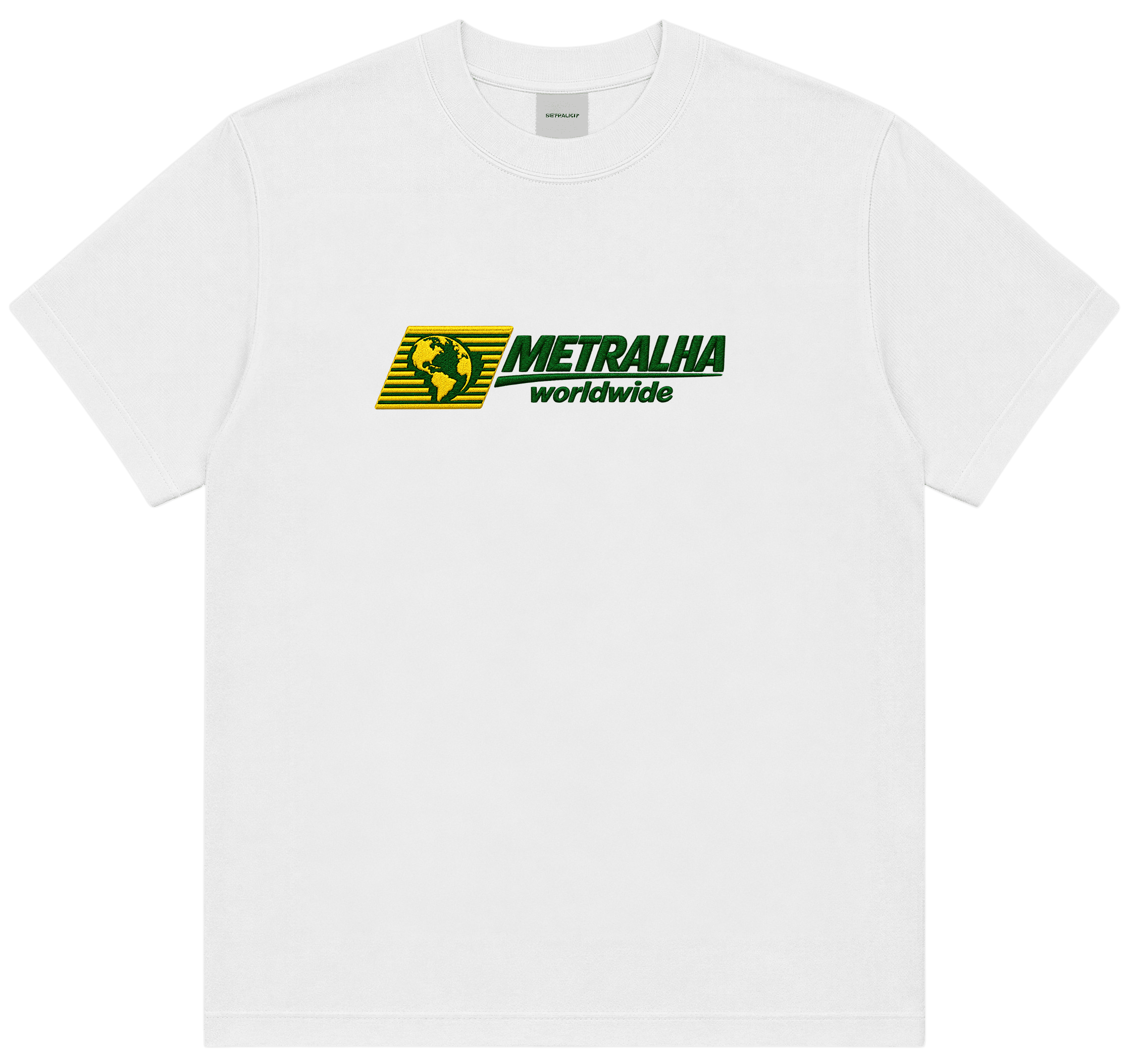 A white short-sleeve crewneck t-shirt featuring a 'METRALHA worldwide' logo printed on the chest. The logo contains a yellow and black striped graphic element on the left, with 'METRALHA' in green and 'worldwide' in black underneath.