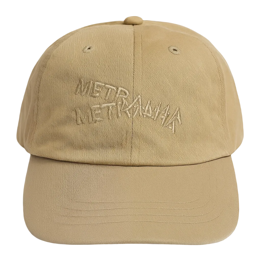 Beige cap with 'METRALLA' branding on a dark gray background